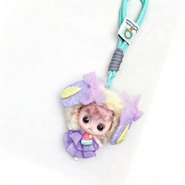 M01317 Llavero de Muñeco Niña